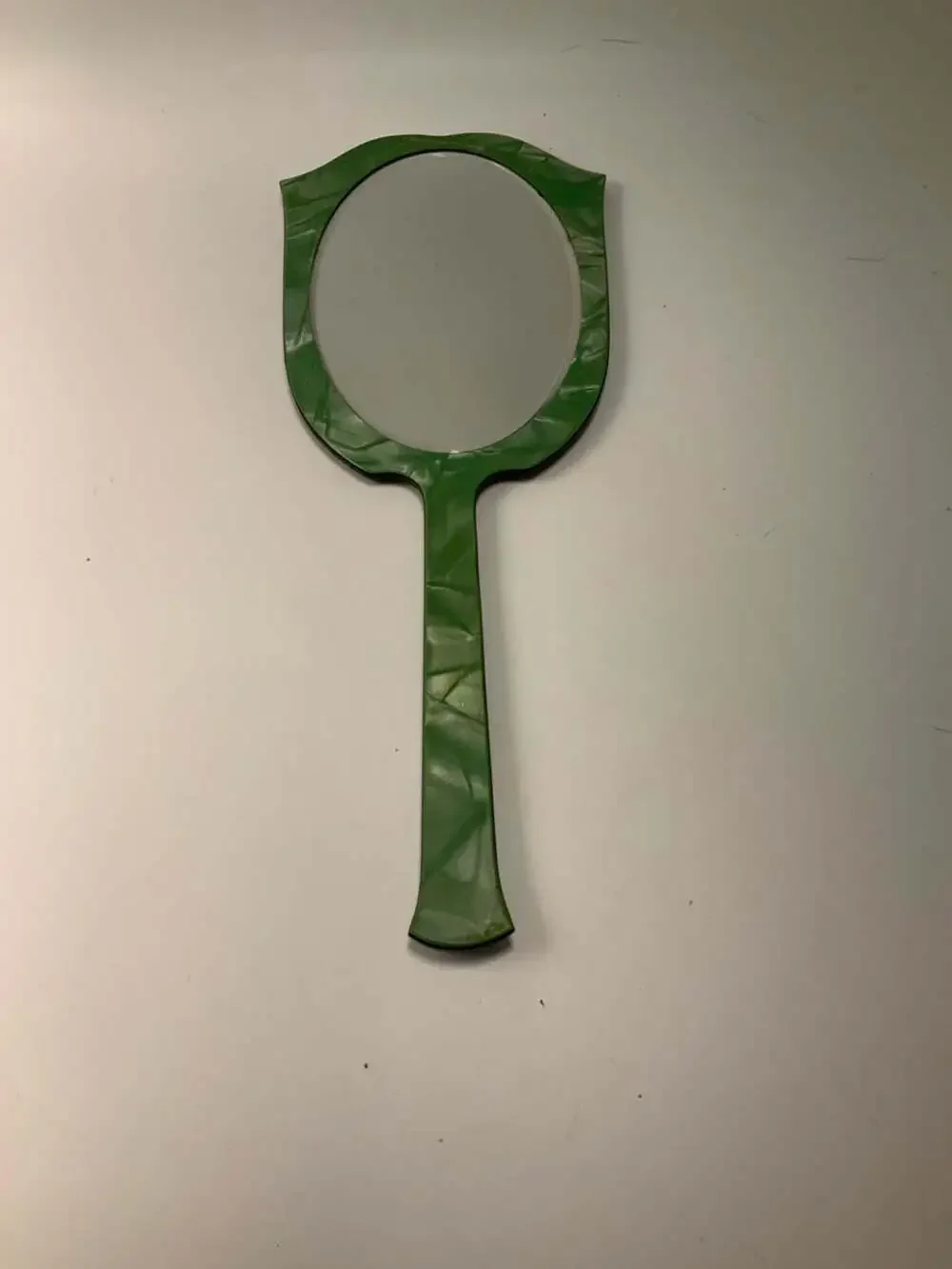 Vintage Art Deco Green Celluloid Hand Mirror With Floral Embossed Design